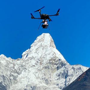 drone flying at high altitude by Ama Dablam